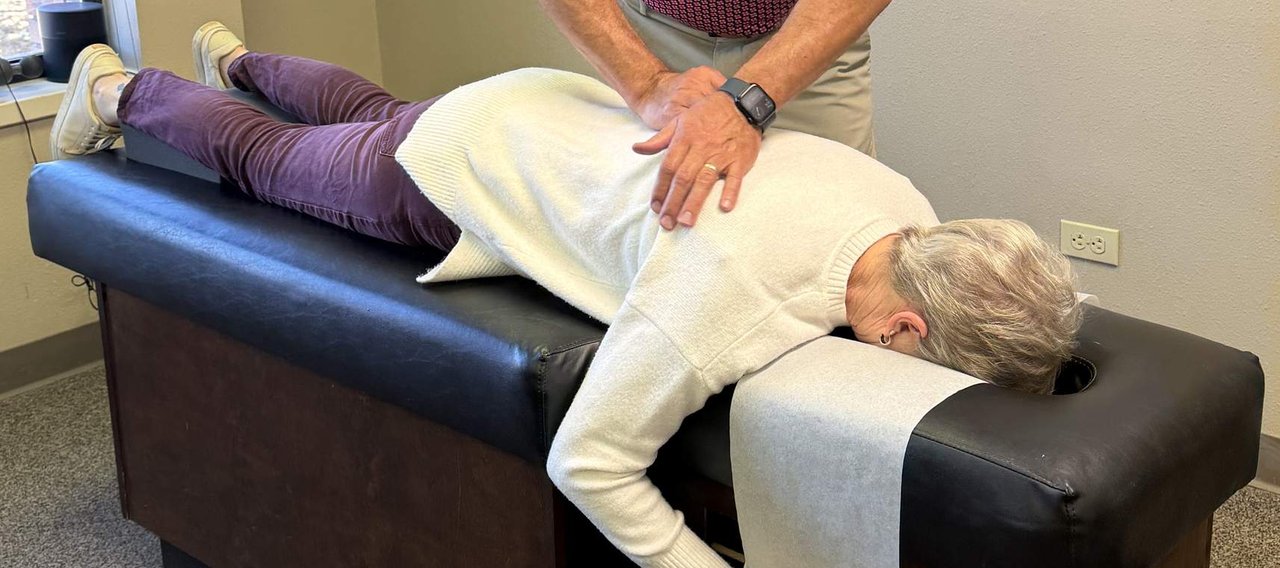 Dr. Aaron Smith adjusting a patient at Back to Health Chiropractic in Colorado Springs